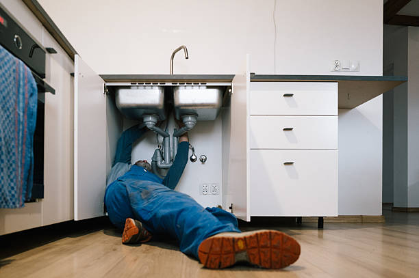 Professional Emergency Plumber technician working in Upland, IN